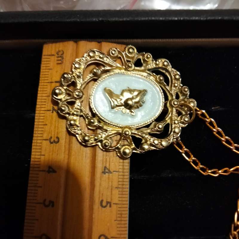 Necklace - Cameo Pendant gold tone on white metal embossed gold tone Lobster clasp metal chain