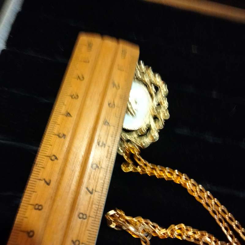 Necklace - Cameo Pendant gold tone on white metal embossed gold tone Lobster clasp metal chain