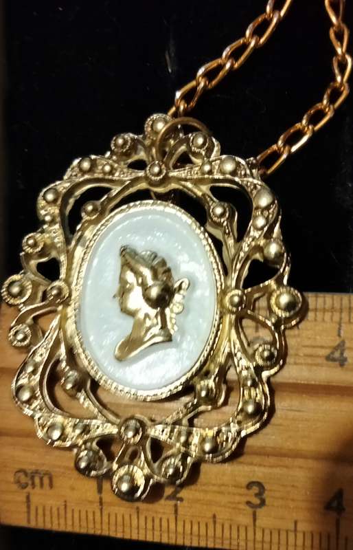 Necklace - Cameo Pendant gold tone on white metal embossed gold tone Lobster clasp metal chain