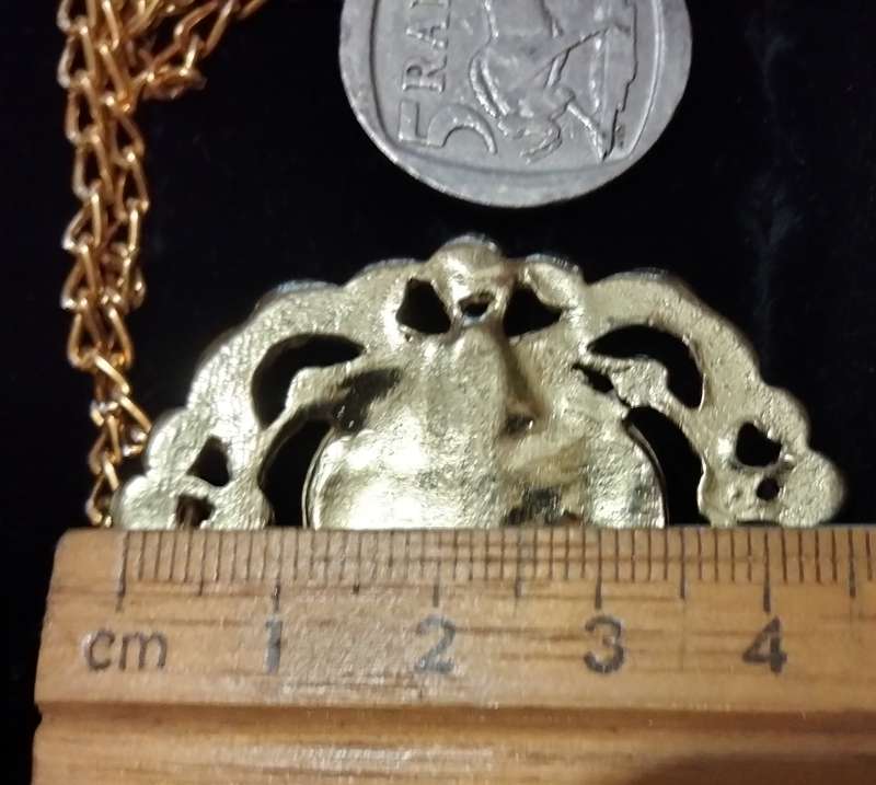Necklace - Cameo Pendant gold tone on white metal embossed gold tone Lobster clasp metal chain