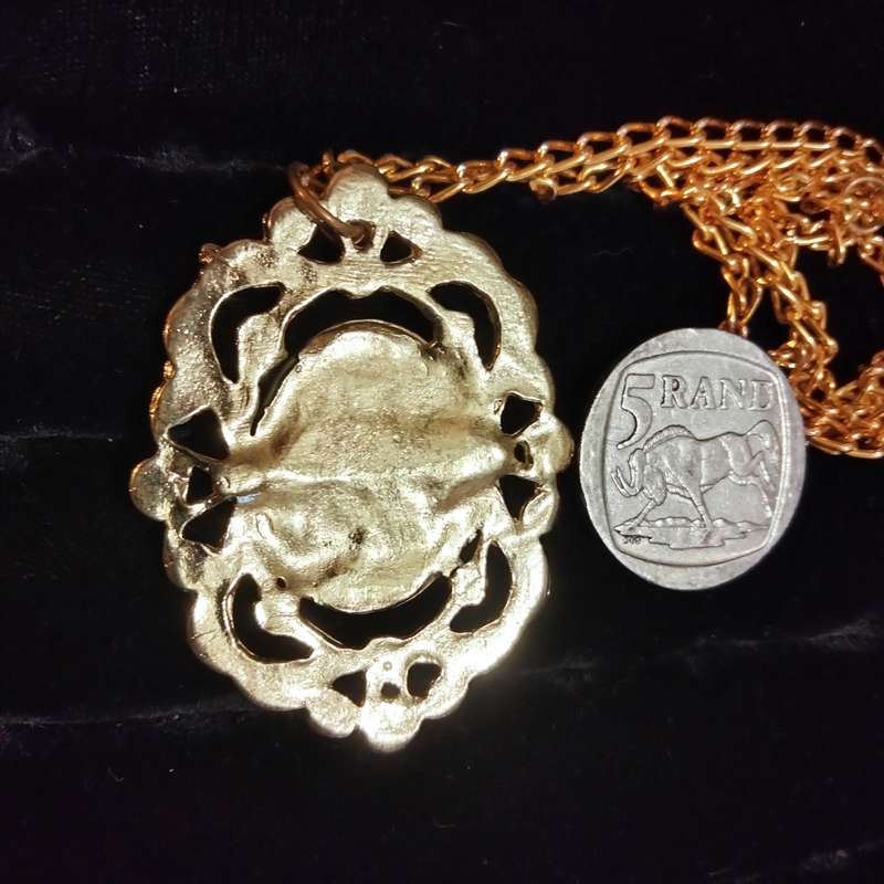 Necklace - Cameo Pendant gold tone on white metal embossed gold tone Lobster clasp metal chain
