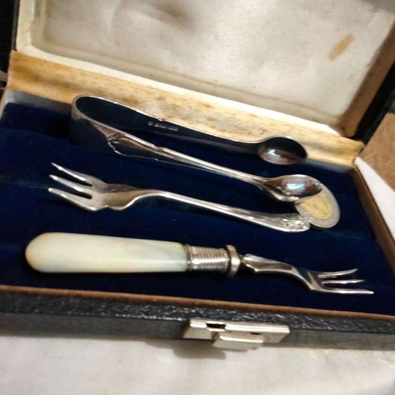 3 EPNS dinner table items 1 sugar Nips +2 pickle Forks1 MOP handle+Box for 1 bid