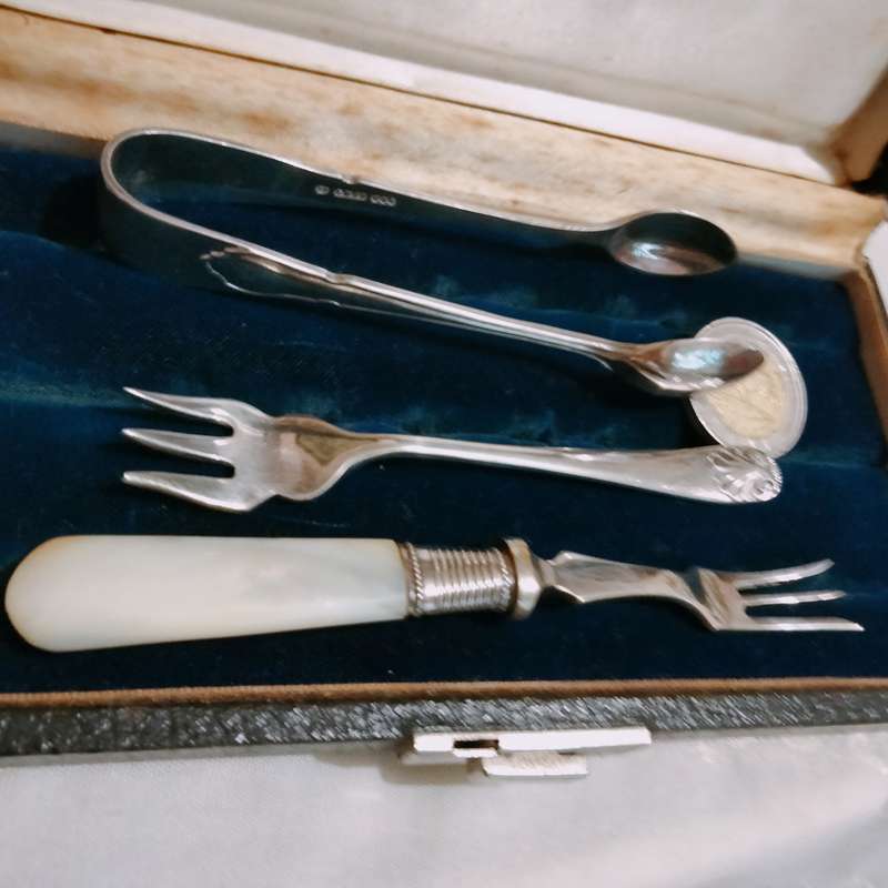3 EPNS dinner table items 1 sugar Nips +2 pickle Forks1 MOP handle+Box for 1 bid