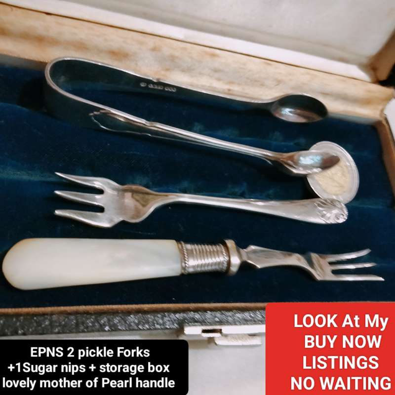 3 EPNS dinner table items 1 sugar Nips +2 pickle Forks1 MOP handle+Box for 1 bid