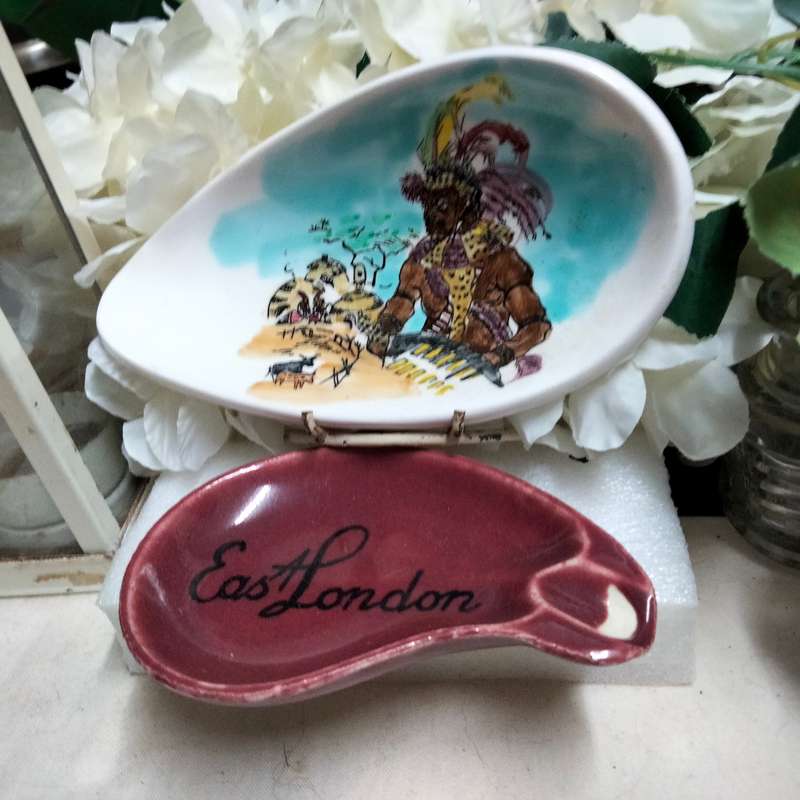 2 Ashtrays  - Van hunks Hand painted S.A. tribal scene+ One has East London on