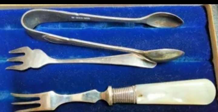 3 EPNS dinner table items 1 sugar Nips +2 pickle Forks1 MOP handle+Box for 1 bid
