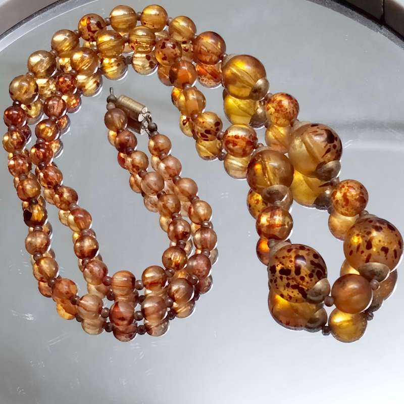 Necklace  AMBER graduating faux round beads+ small beads gold tone metal spacers + barrel clasp