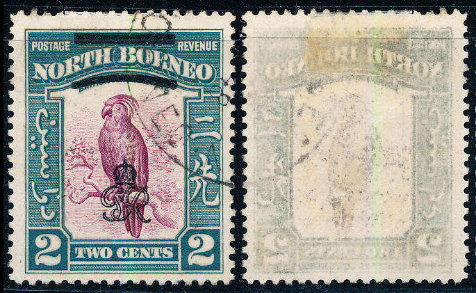 North Borneo - 1947 - Defins with black bar ovpt - 2c purple & greenish-blue fine used . SG 336 .