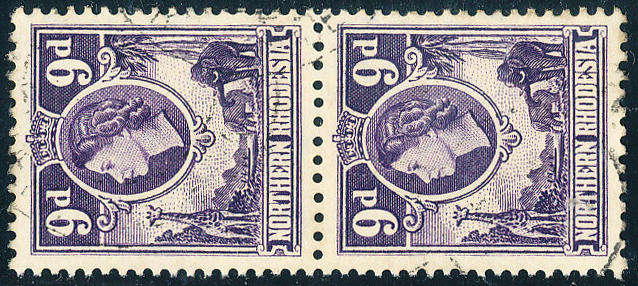 Northern Rhodesia - 1953 - Eliz Defins - 9d violet fine used vertical pair . SG 69 .