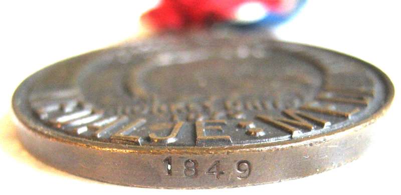FULL SIZE JOHN CHARD MEDAL WITH VOIDED ACORN AND FOR ARMY SERVICE NUMBERED 1849 IN GOOD CONDITION