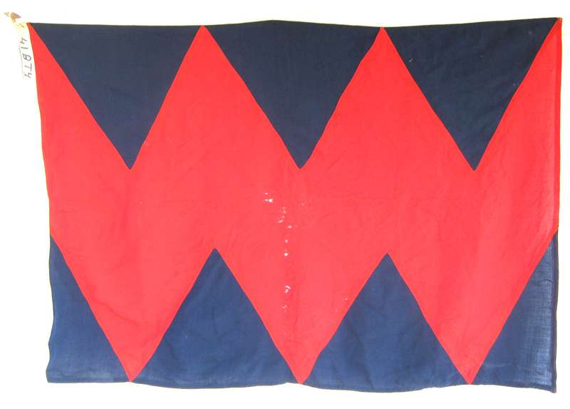 OLD SADF ARTILLERY FLAG WITH 41 BATTERY WRITTEN ON IT 120 X 85 CMS - SMALL AGE HOLES IN THE MIDDLE