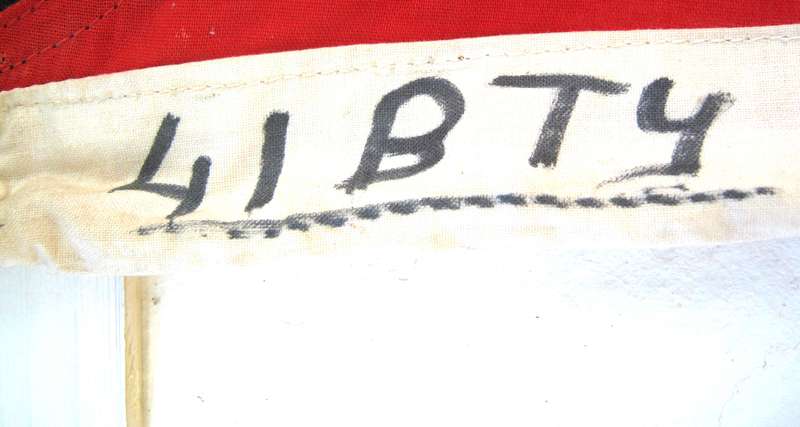 OLD SADF ARTILLERY FLAG WITH 41 BATTERY WRITTEN ON IT 120 X 85 CMS - SMALL AGE HOLES IN THE MIDDLE