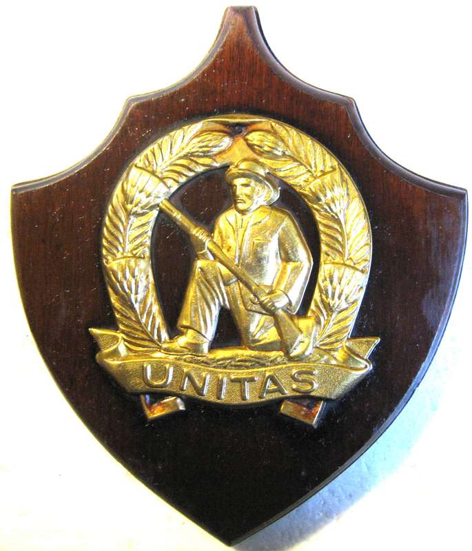 SADF COMMANDO METAL BADGE ON WOODEN SHIELD 21 X 18 CM  IN GOOD USED CONDITION