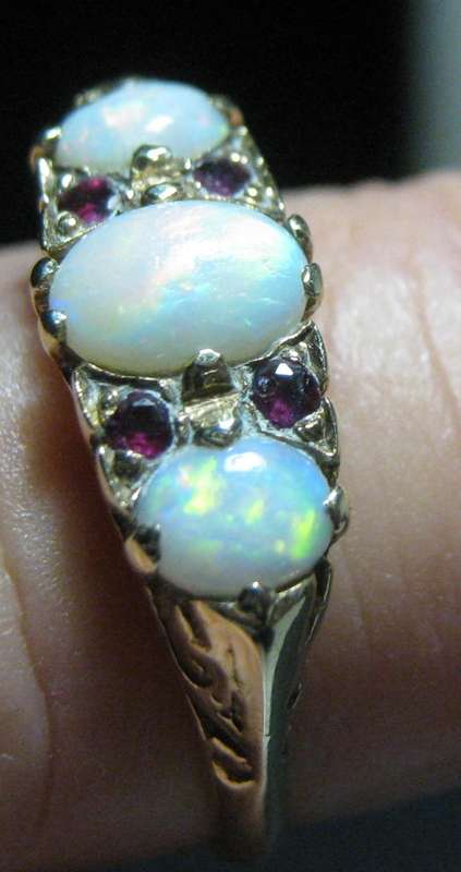 ANTIQUE 9CT YELLOW GOLD 3 STONE OPAL RING WITH 4 SMALL RUBIES 3 GRAMS TOTAL WEIGHT