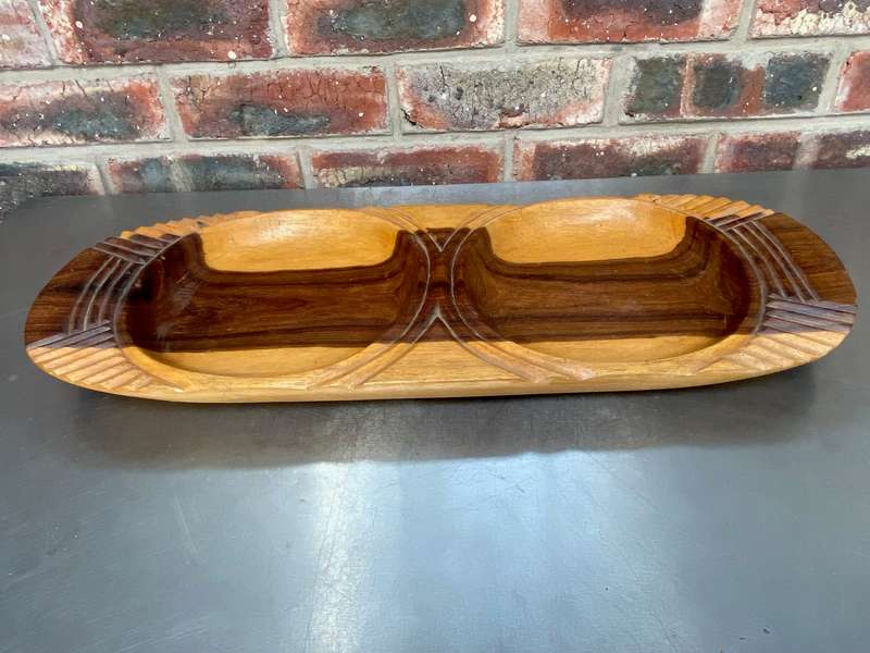 Handcrafted wooden african snack board, made out of one piece of wood,