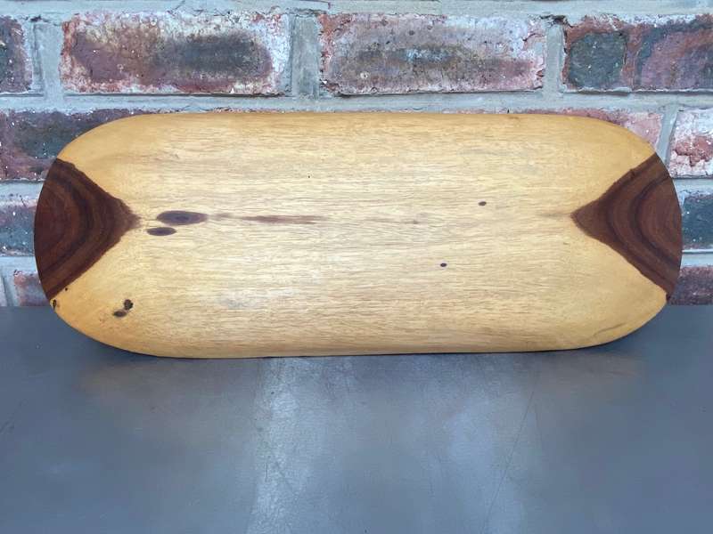 Handcrafted wooden african snack board, made out of one piece of wood,