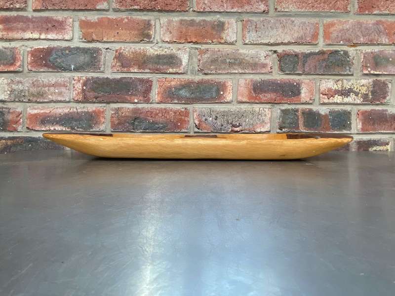 Handcrafted wooden african snack board, made out of one piece of wood,