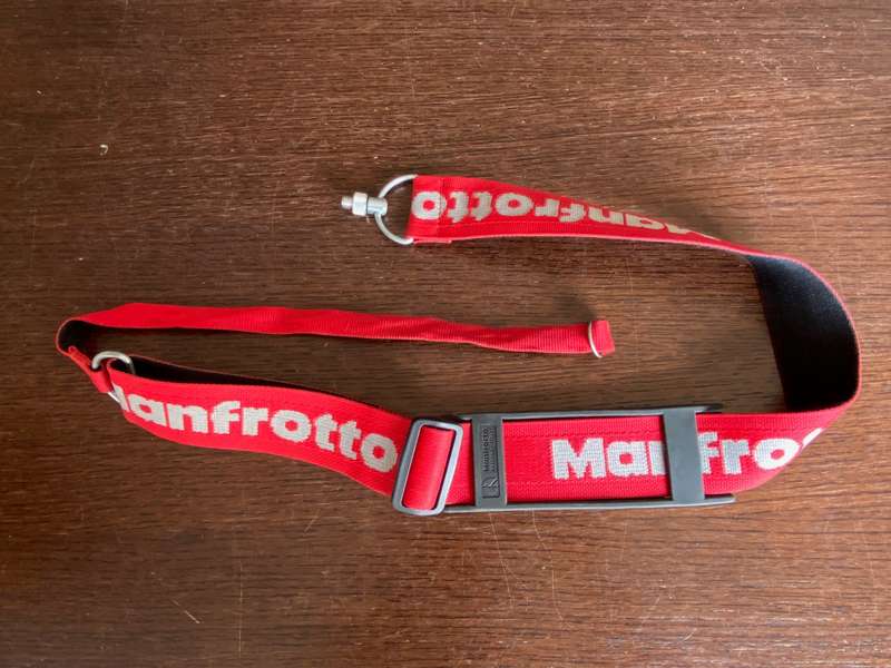 1 x Manfrotto Tripod carrying strap red in very good condition