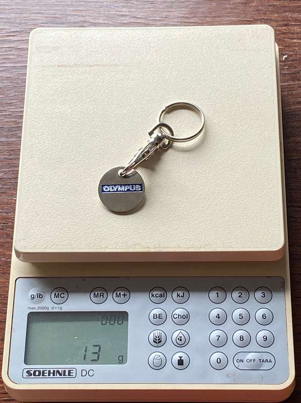Olympus Keyring , vintage collectors item