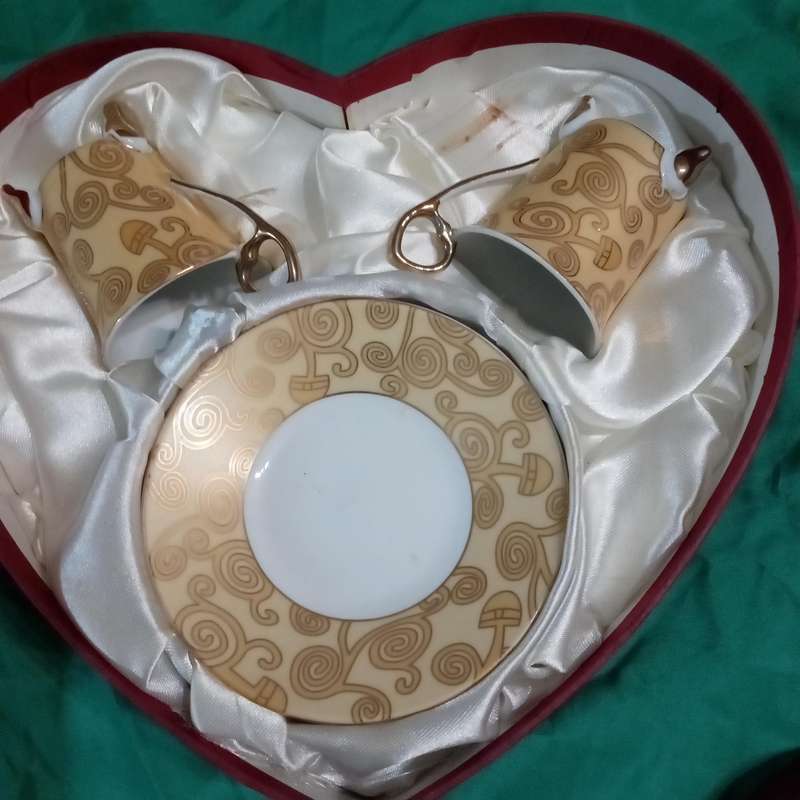 VINTAGE CUP AND SAUCER