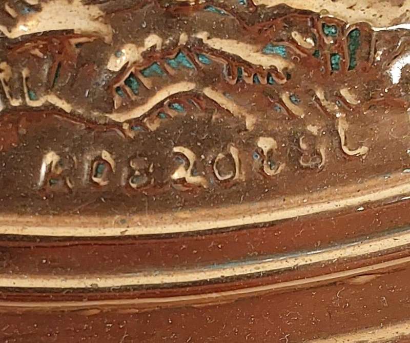 Round, copper wall plate depicting a romantic scene in repoussé  RD820684 Made in England