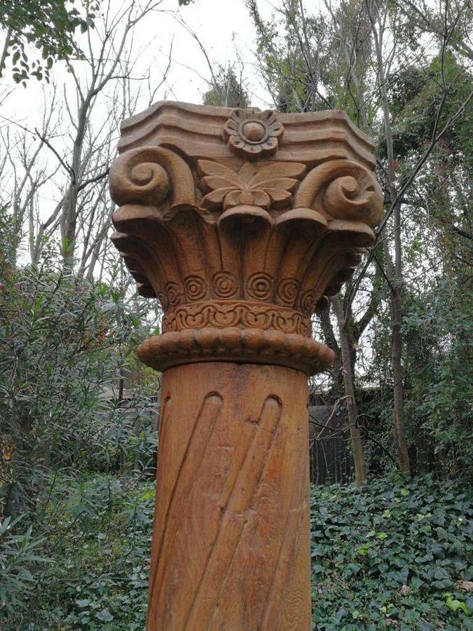 A 19th Century Pair of French Carved Teak Architectural Columns with Concrete Bases