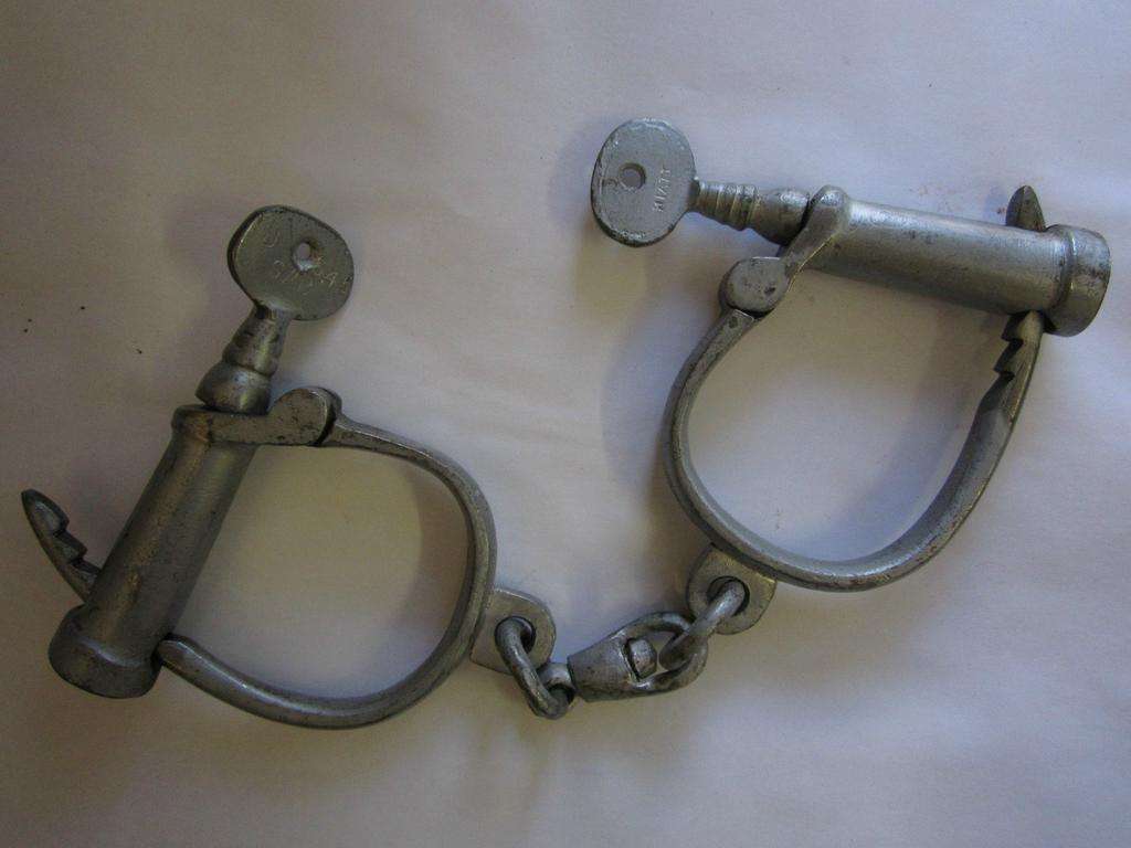 SOUTH AFRICAN POLICE  HIATT HANDCUFFS - WITH BOTH KEYS