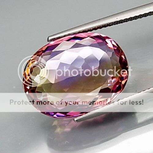 ONE OF OUR BEST!  AMAZING 13.56CT. OVAL FACET 100% NATURAL HUGE PURPLE AND GOLDEN BOLIVIAN AMETRINE