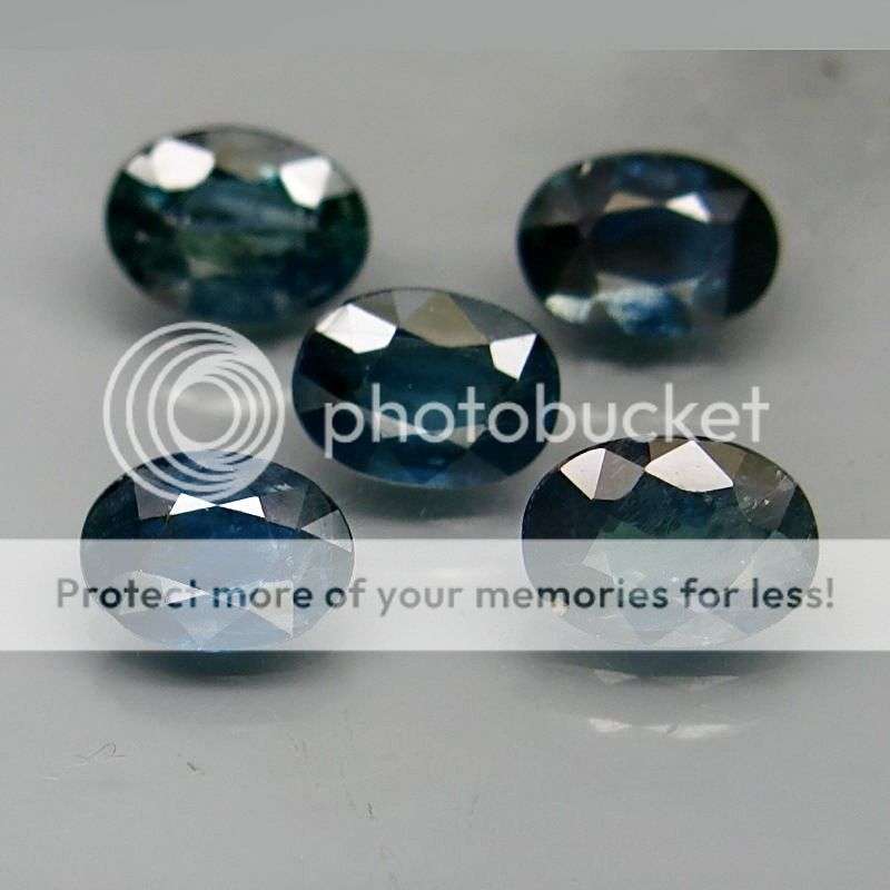 THIS IS A STUNNING TOP BLUE LOT OF 5.12CTS.(5 PCS.) OVAL FACET 100% NATURAL SAPPHIRES