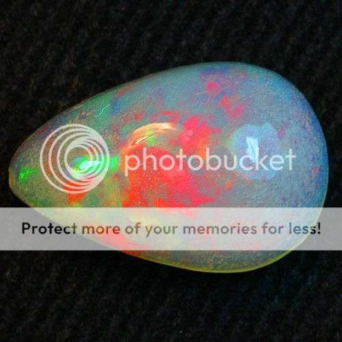 WORLD CLASS MUSEUM QUALITY  3.00CT. PEAR FACET 100% NATURAL ELECTRIC RED RAINBOW PLAY DELANTA  OPAL
