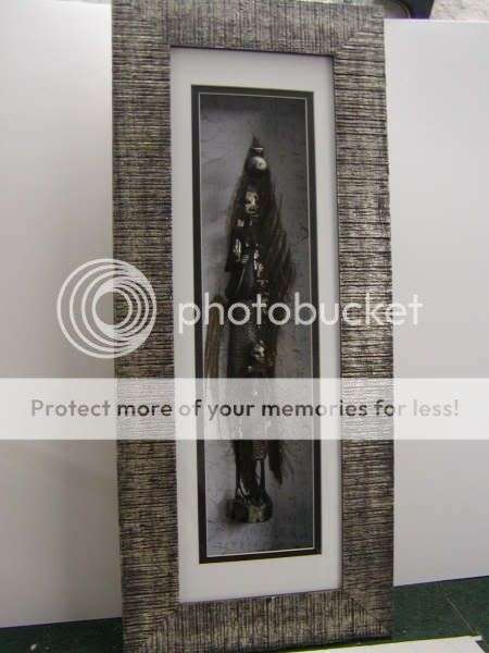 African Figure with silver highlights on palmbark