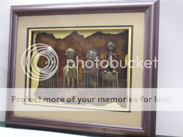 Antique African combs with gold highlights on handmade paper
