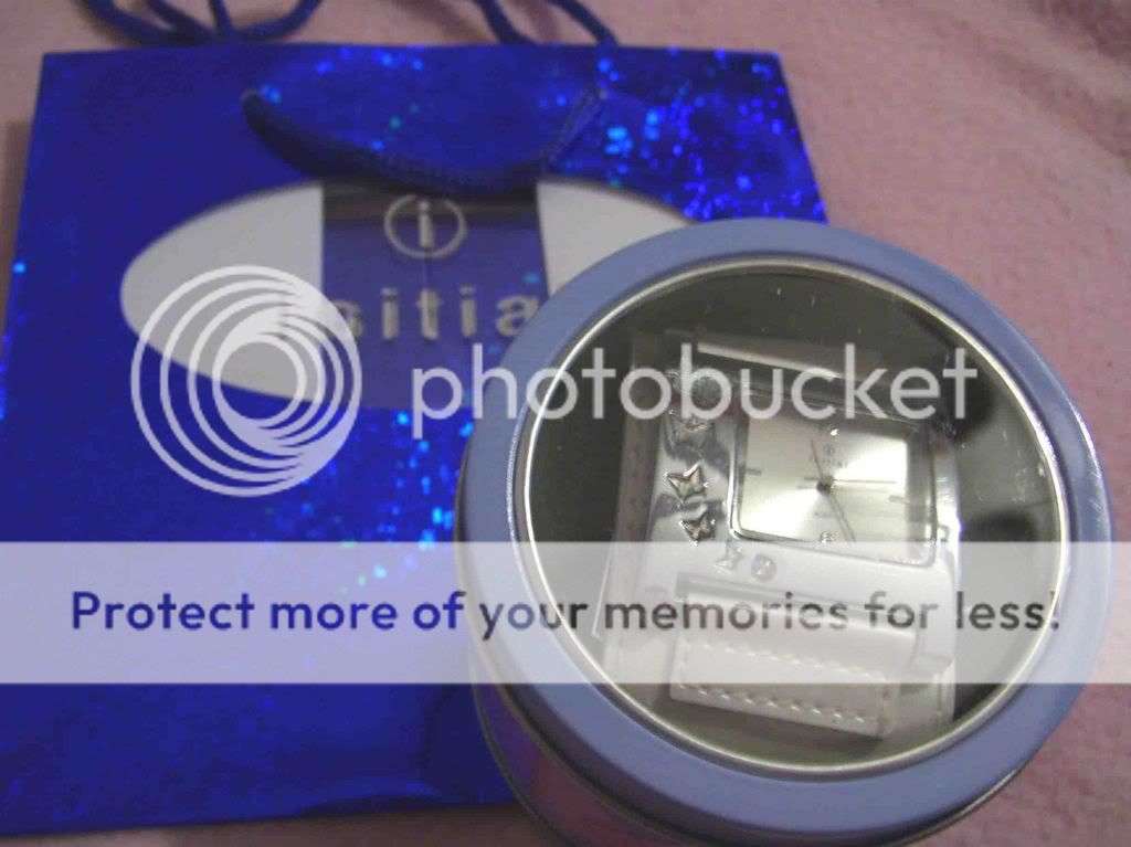 Authentic Initial Lady's watch with gift bag... in White