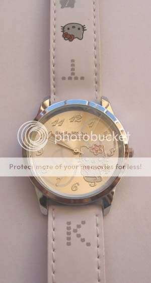 VERY CUTE WHITEAND SILVER HELLO KITTY WATCH!!