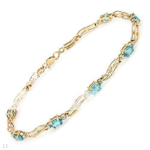 2.11ctw Diamond and Topaz 4.20g 10K Yellow Gold Bracelet