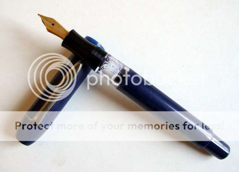 Vintage blue piston fill fountain pen with curious curled 14kt plated nib - working, nice writer!