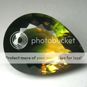 31.30cts.RAVISHING YELLOW GREEN AMETRINE PEAR GEM.