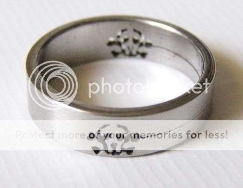 SOLID STAINLESS STEEL BAND RING. SKULL