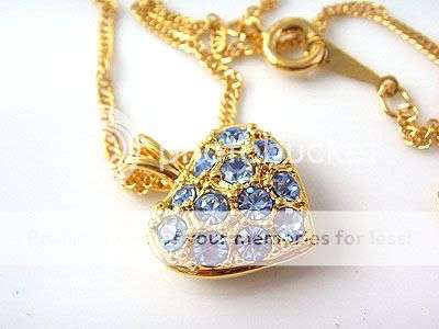 Stunning detail lab enhanced Aquamarine Heart pendant!