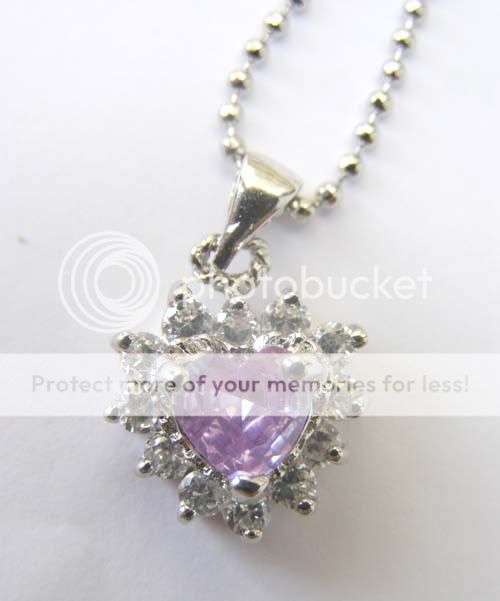 Stunning 18kwgp CZ pendant purple