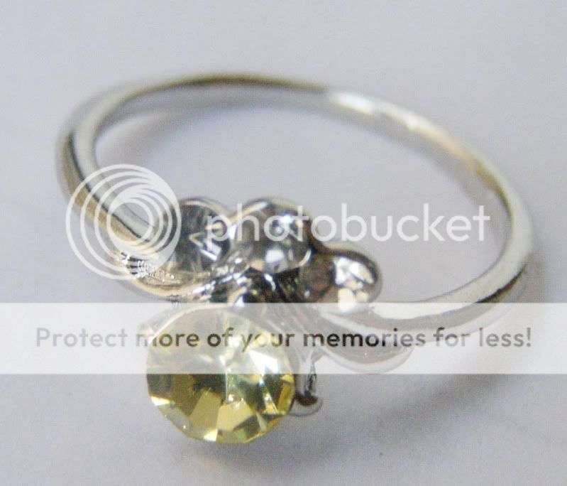 Beautiful sim diamond and 18kgp ring size 7