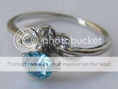 Stunning aqua sim diamond 18kgp ring size 7