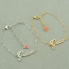 **IN STOCK** - Beautiful "GUESS" Elegant cursive Logo =  Available in GOLD or SILVER