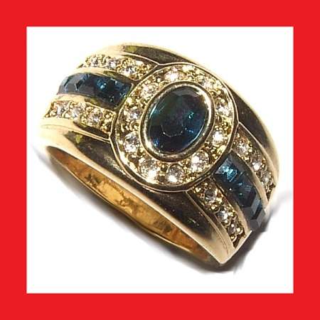 BLUE AND WHITE CRYSTAL ENCRUSTED DRESS RING IN 18K YELLOW GP.