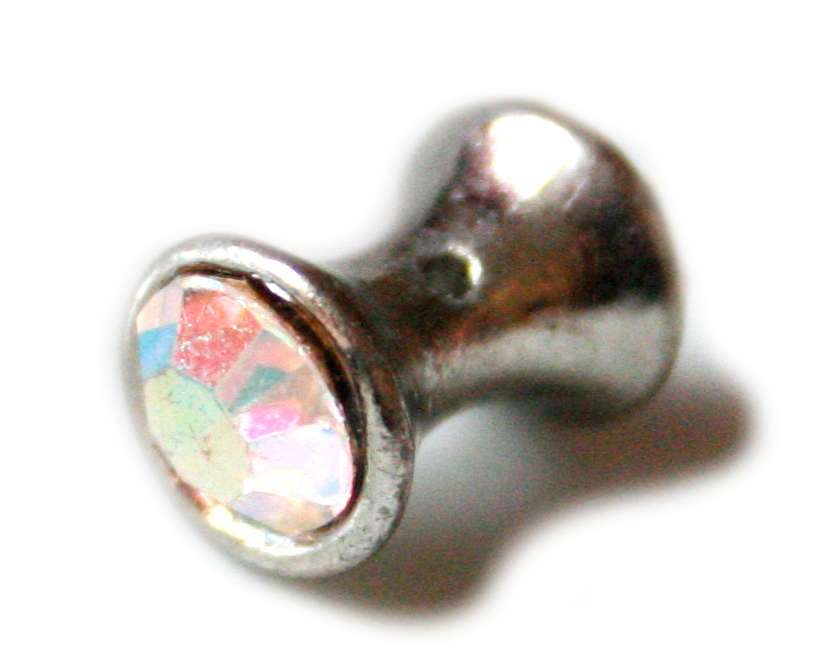 Silver coloured spacer. 13.8x7.9mm