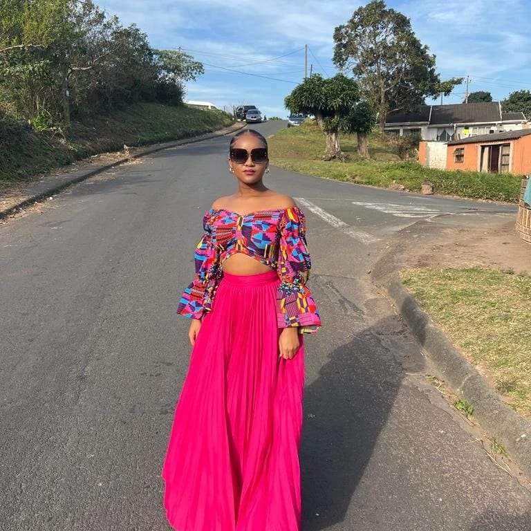 High Waisted Pleated Skirt and Long Sleeve Crop Top