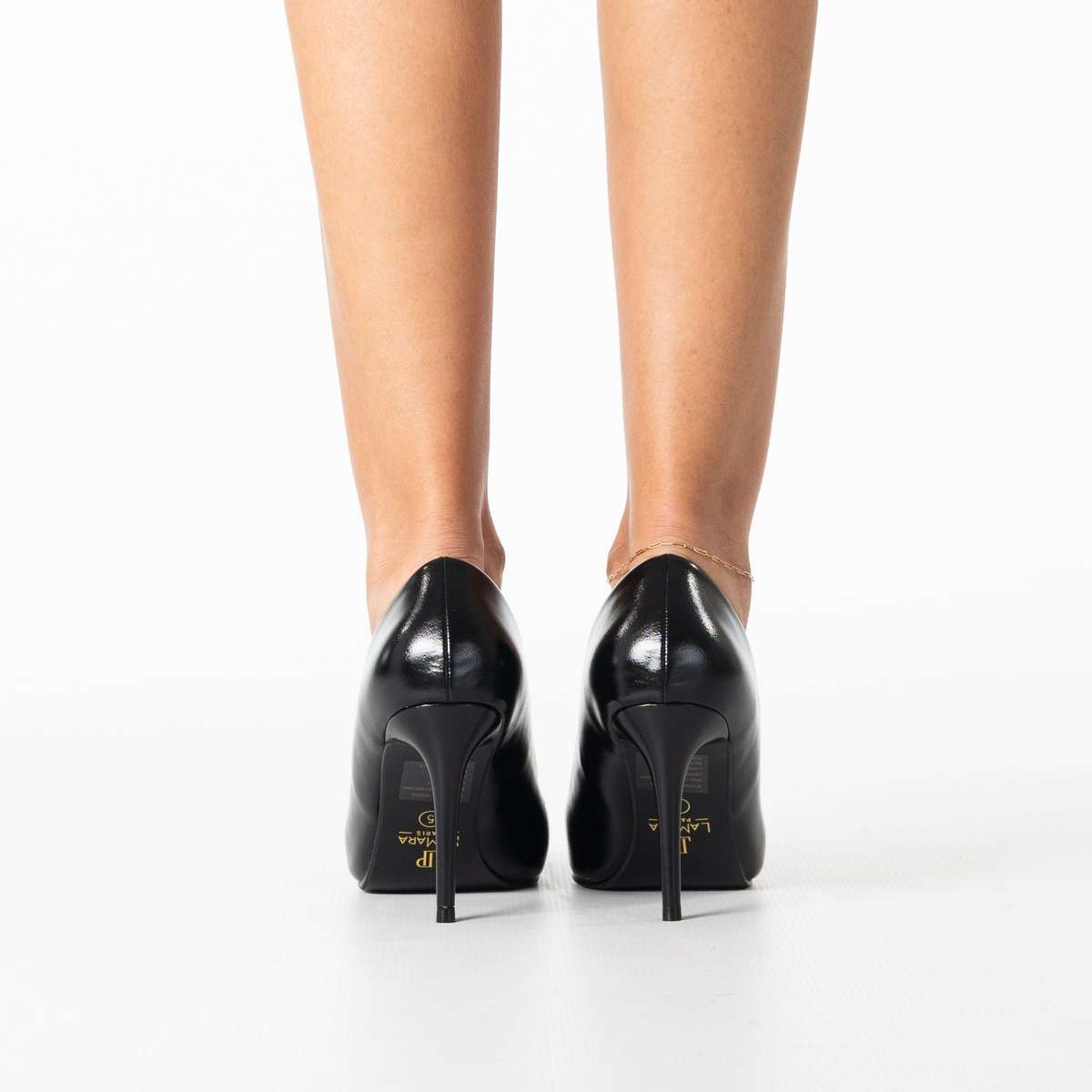Voss women's sleek pointed heel with statement buckle detail