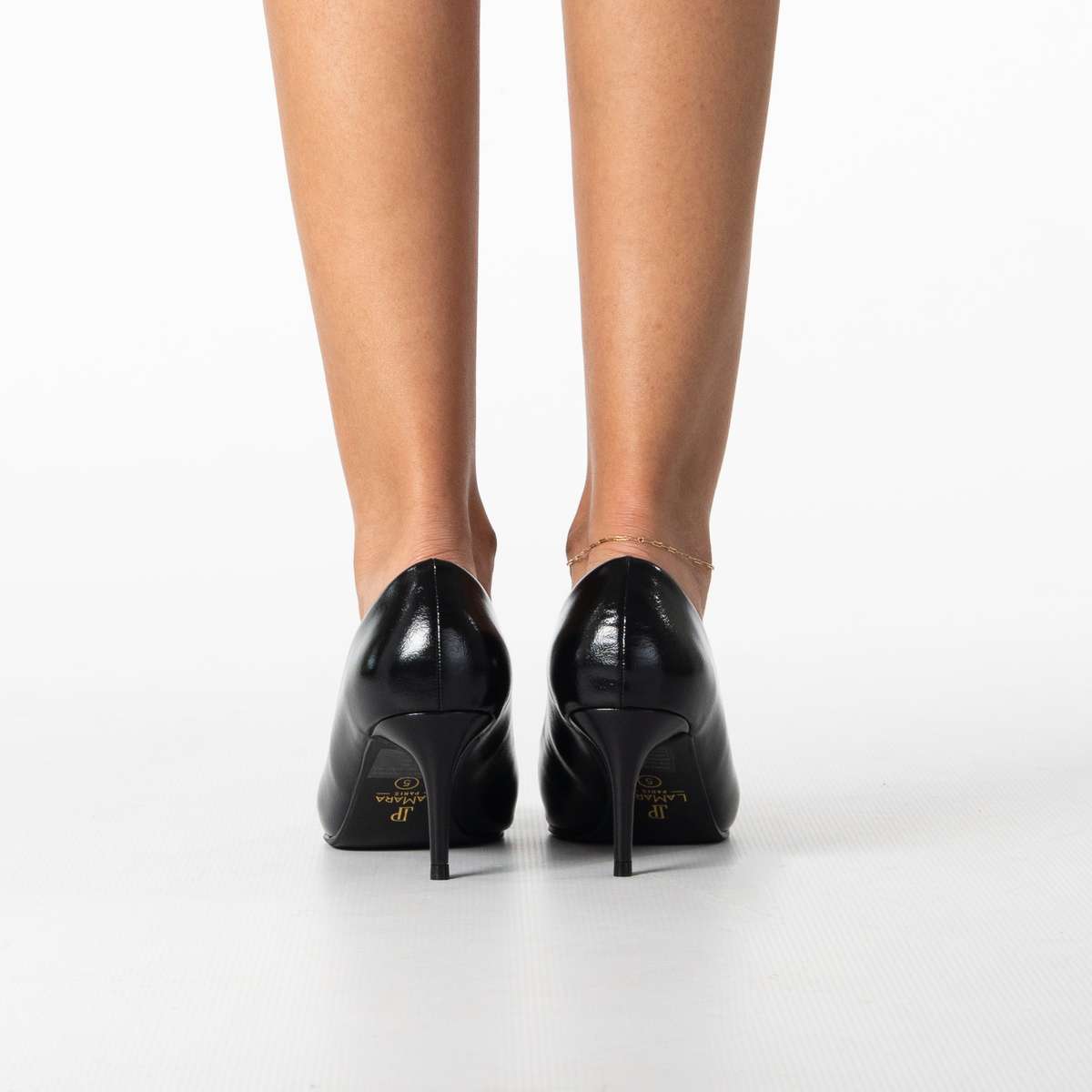 Platinum women's elegant pointed heel with refined buckle detail