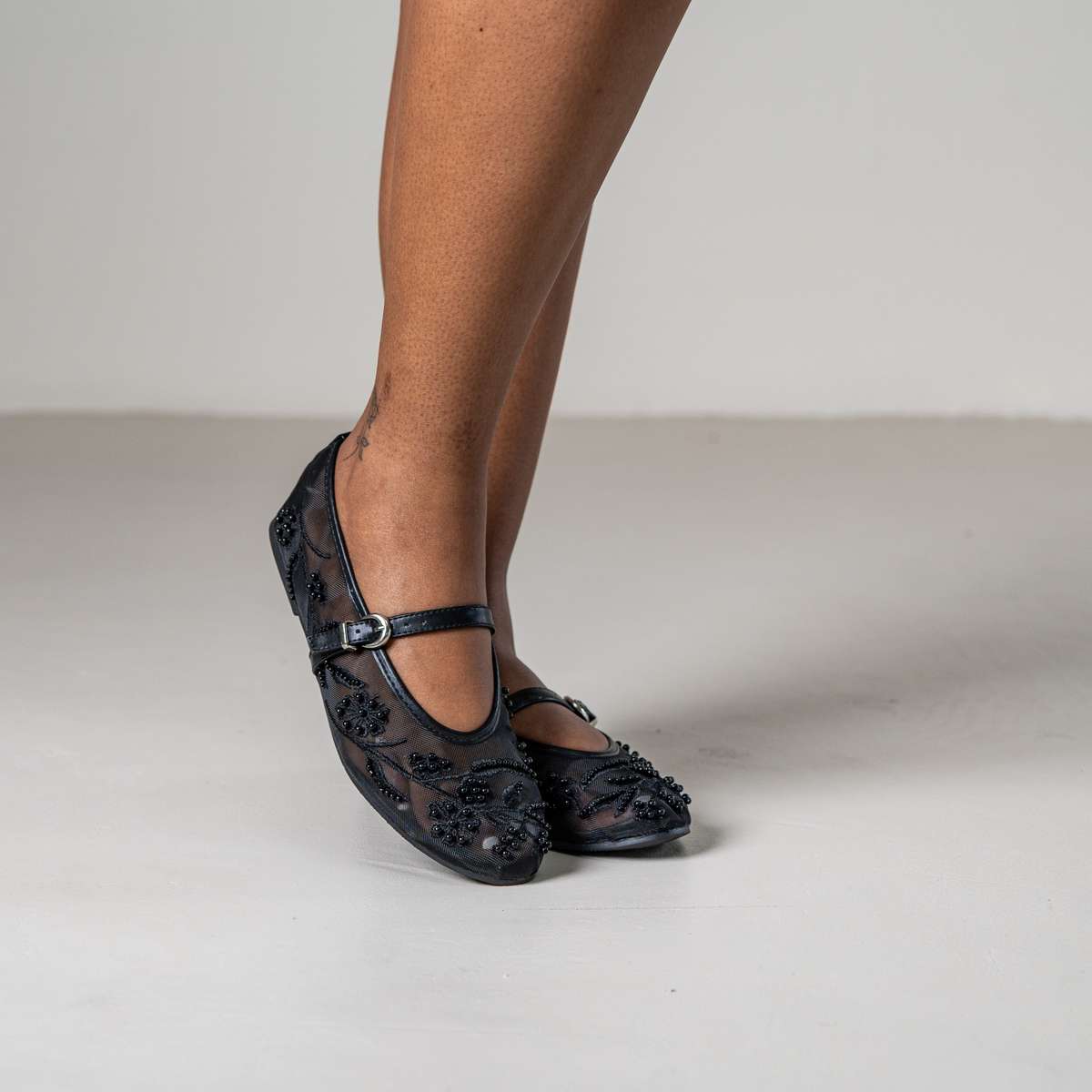 Petal beaded floral pump with strap and embellishments