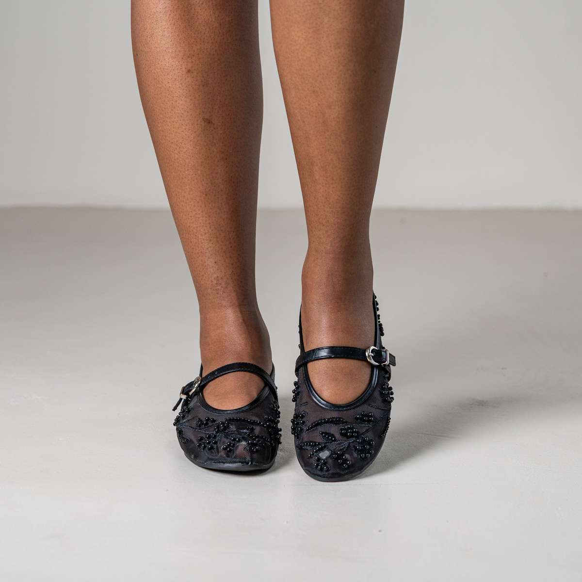 Petal beaded floral pump with strap and embellishments